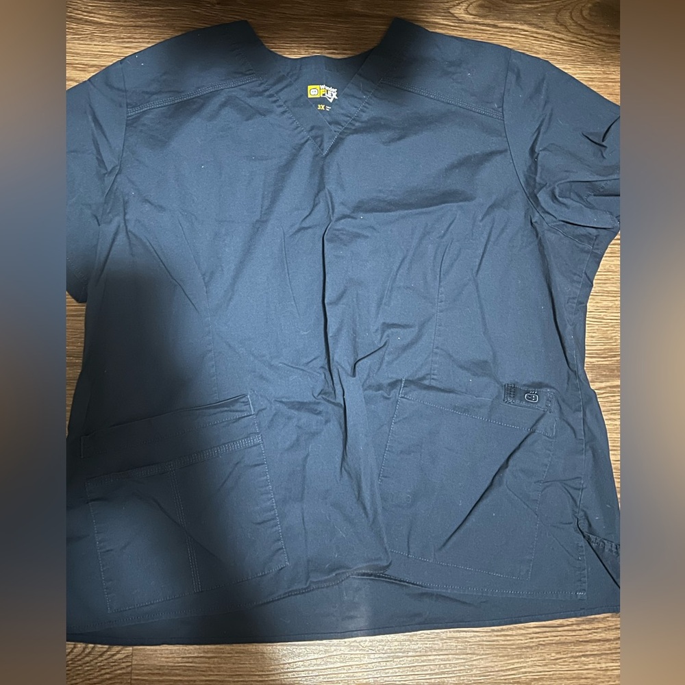 Navy wonder wink scrub top